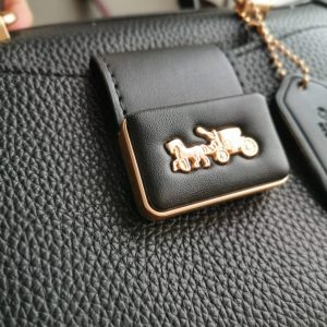 Сумки Coach