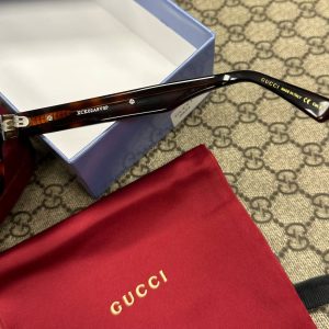 Солнцезащитные очки Gucci