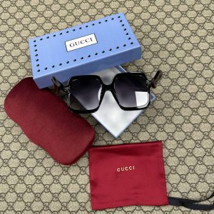 Солнцезащитные очки Gucci