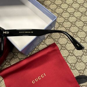 Солнцезащитные очки Gucci