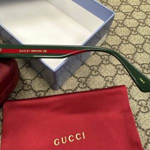 Солнцезащитные очки Gucci