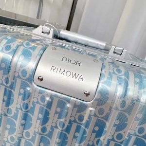 Чемодан Dior и Rimowa