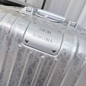 Чемодан Dior и Rimowa